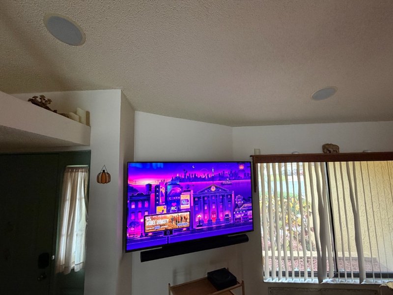 65 inch TV with Sonos soundbar and in-ceiling speakers