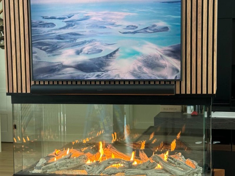 TV and Sonos Above Slatted Fireplace