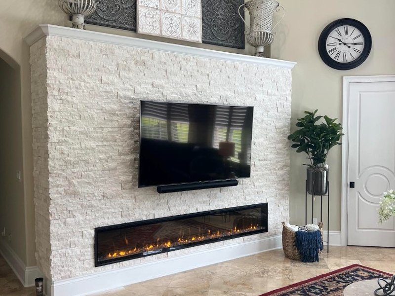 TV and Soundbar on Stone Fireplace