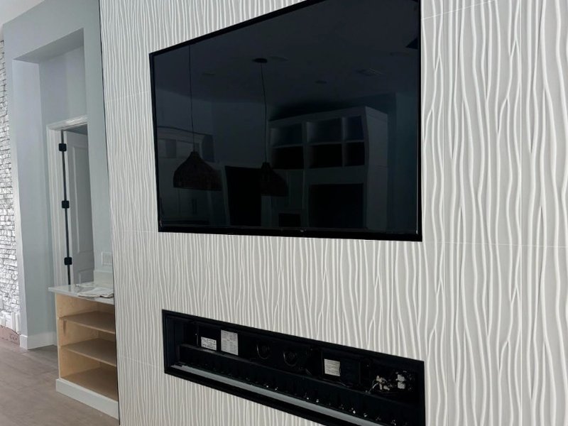 TV on Textured 3D Accent Wall
